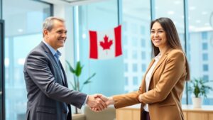 Employer and candidate shaking hands in Canadian office